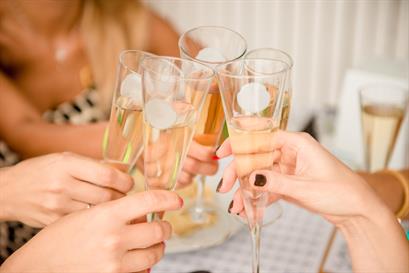 5 Glasses Being Held Together for a "Cheers"