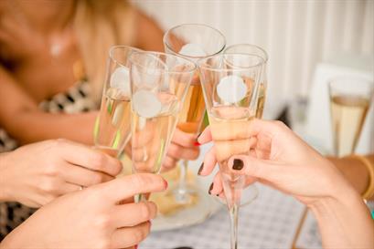 5 Glasses Being Held Together for a "Cheers"